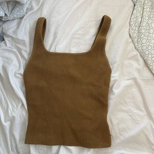 Aritzia’s Babaton ribbed knit tank sweater in brown .